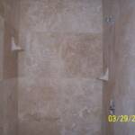 Traverteen tile shower.